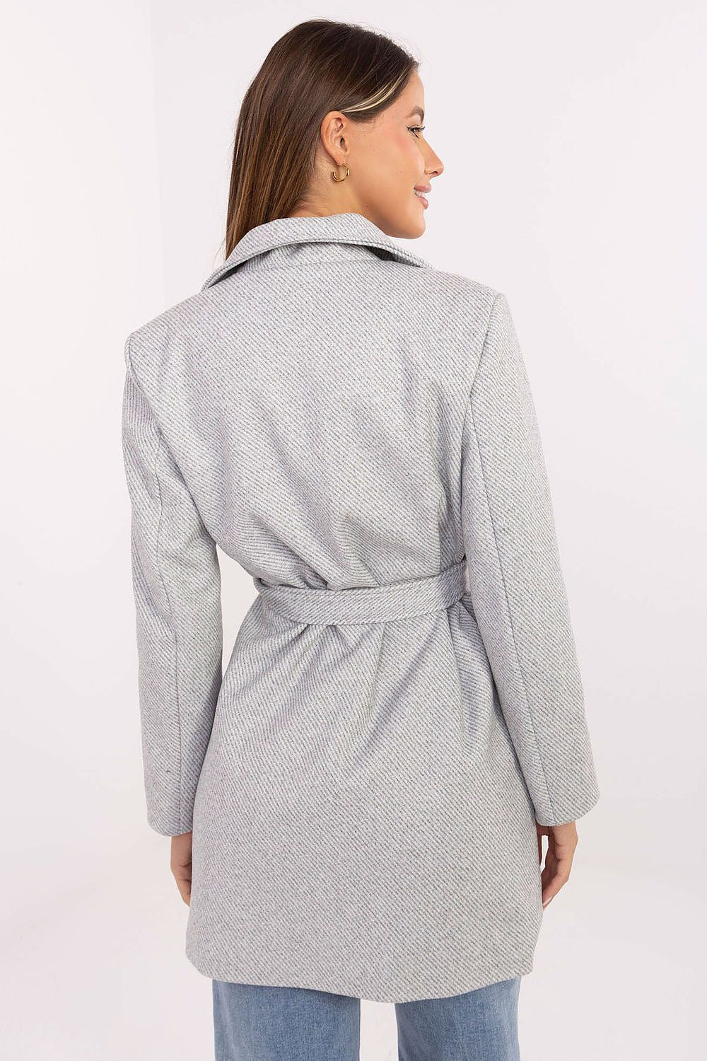 Model showcasing the Rue Paris mid-thigh coat with a chic belt and slip pockets, ideal for both casual and formal occasions.