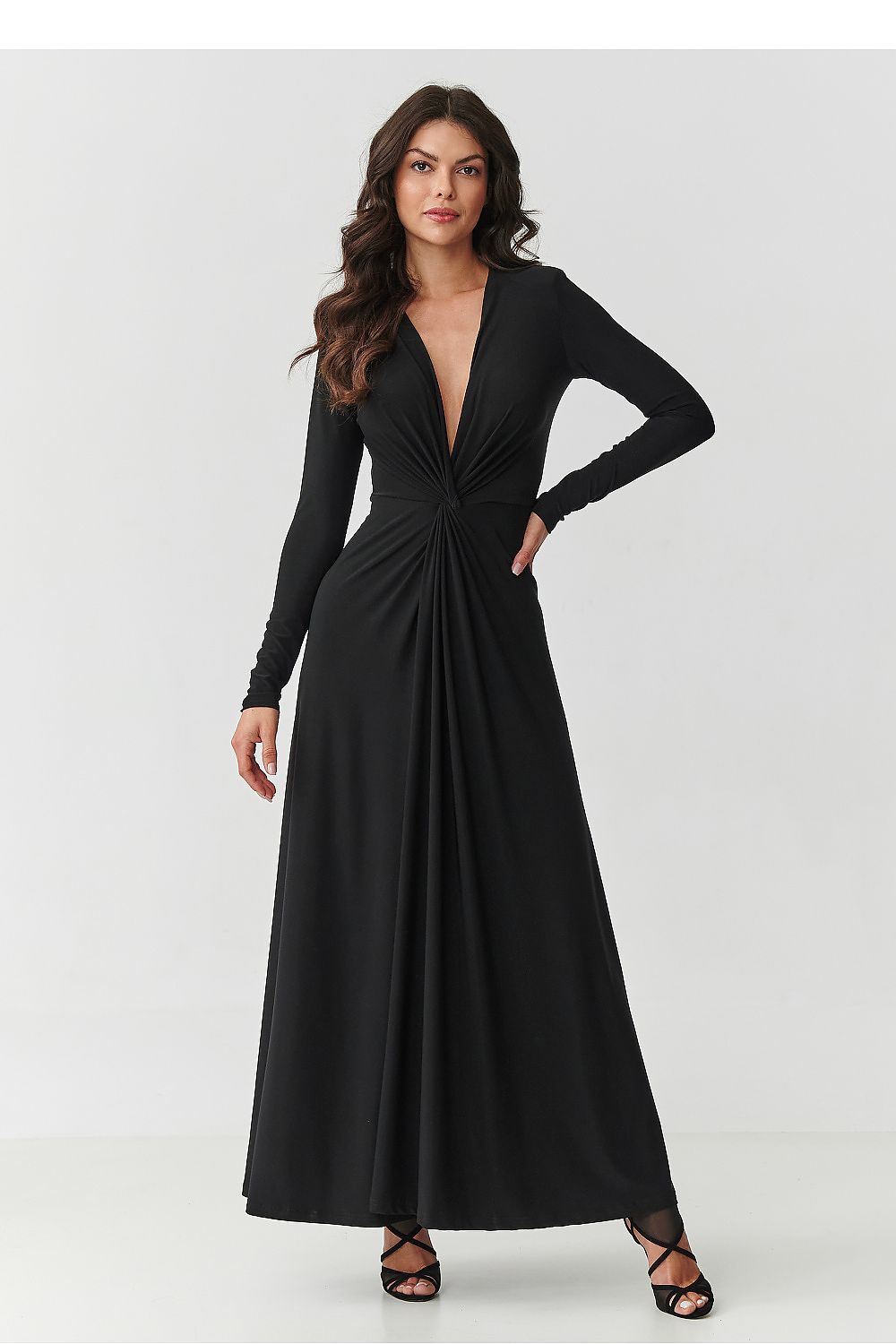 Elegant black maxi dress by Makadamia, featuring a deep V-neck and flattering ruching at the waist, perfect for sophisticated occasions.