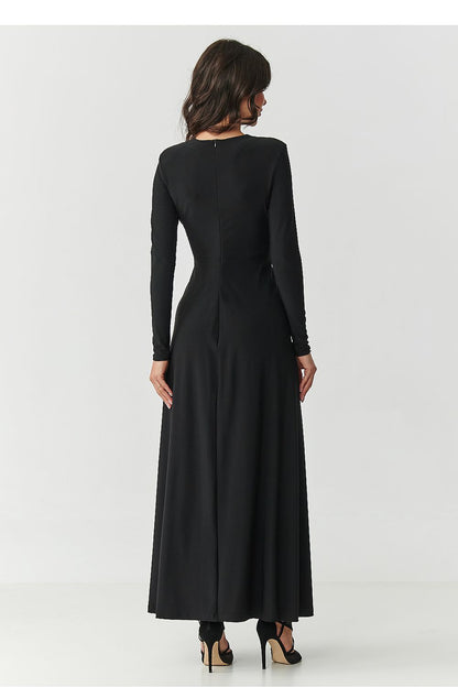 Elegant black maxi dress by Makadamia featuring a deep V-neck design, stylish ruching at the waist, and a flowing silhouette perfect for special occasions.