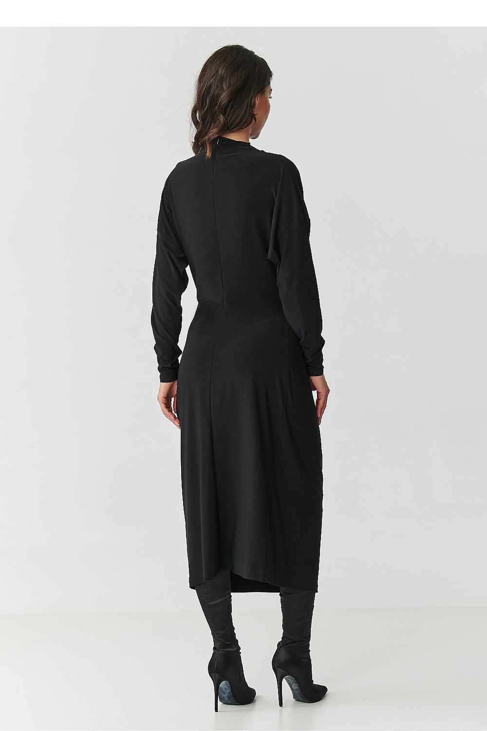 Luxurious Makadamia midi dress showcasing elegant draping and feminine silhouette, ideal for business meetings and evening events.