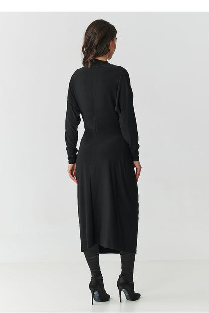 Luxurious Makadamia midi dress showcasing elegant draping and feminine silhouette, ideal for business meetings and evening events.