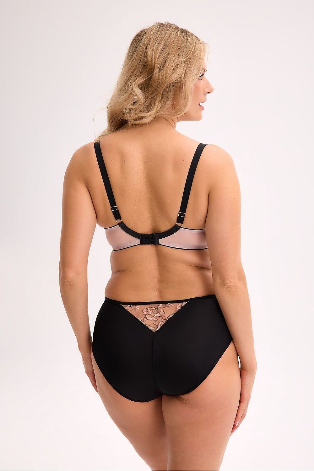 Luxurious semi-soft bra by Gaia featuring intricate embroidery and elegant mesh inserts in a sophisticated design for ultimate comfort.