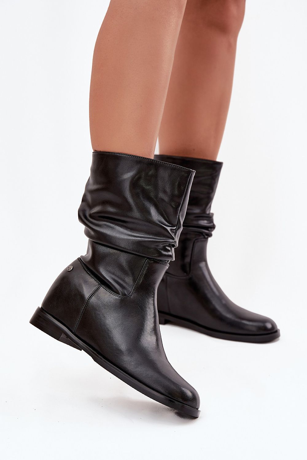 Luxury women's Maciejka leather boots with warm lining, featuring a flat heel, perfect for colder days. Designed by Step in style, these elegant boots combine high-quality natural leather and fashionable gathered upper to complement any wardrobe.