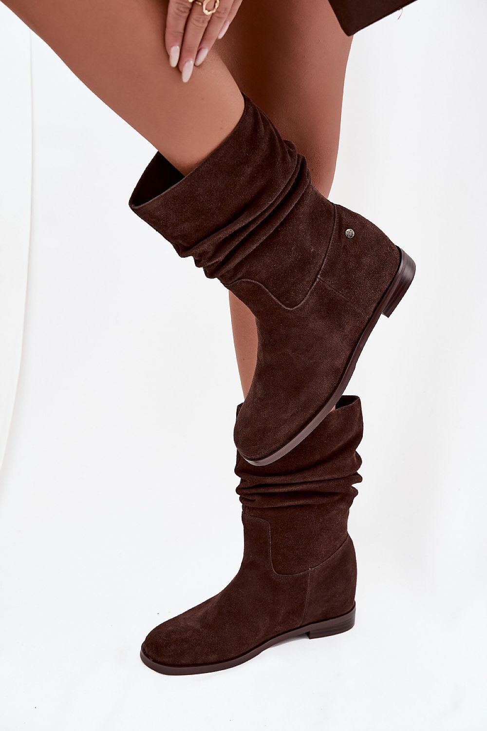 Stylish flat-heeled women's ankle boots by Step in Style, showcasing exquisite craftsmanship and warmth, ideal for pairing with jeans, leggings, dresses or skirts.