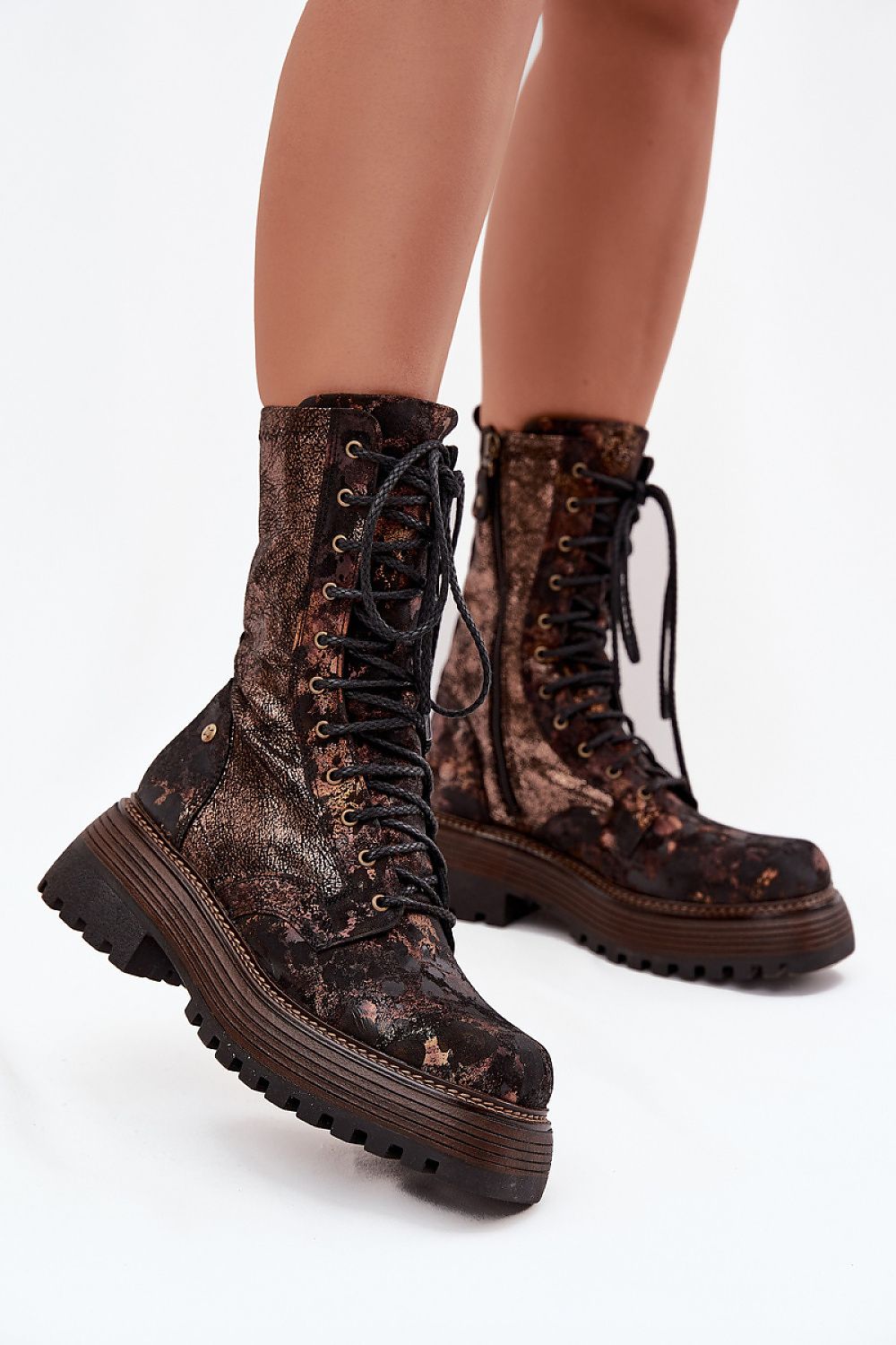 Elegant Maciejka women's ankle boots made from natural leather, showcasing a stylish design with a zipper and laces, perfect for luxury fashion lovers.