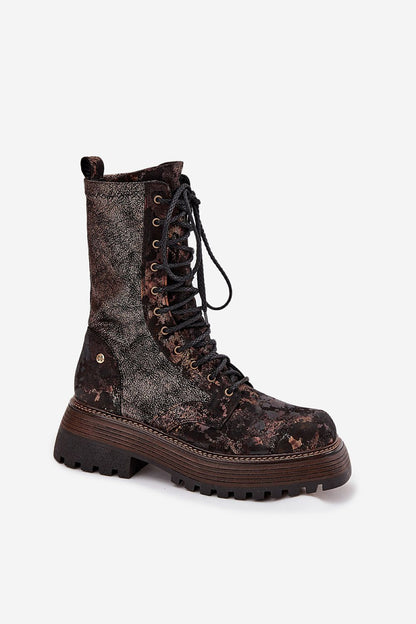 Close-up view of Maciejka women's natural leather ankle boots, featuring a comfortable soft insole and a chic flat heel, ideal for elegant outfits.