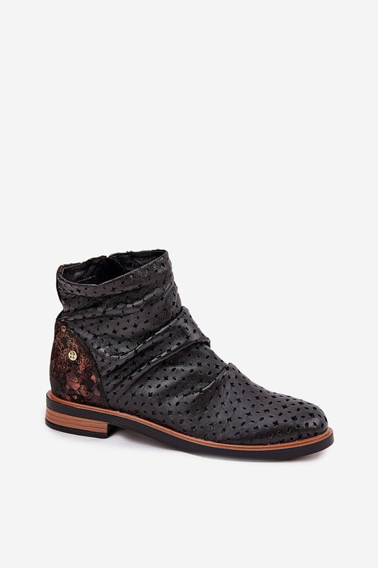 Close-up of Maciejka Women's Natural Leather Ankle Boots with exquisite openwork detailing, showcasing luxury craftsmanship and versatility for any fashion-forward wardrobe.