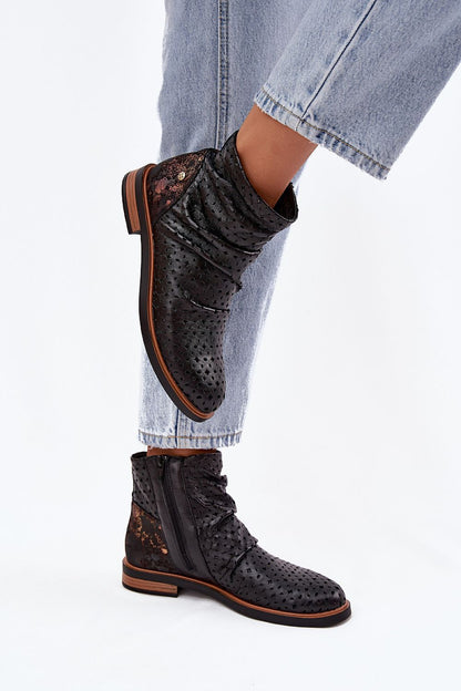 Sophisticated Maciejka women's ankle boots showcasing a refined openwork pattern, designed for a luxurious feel and classic feminine silhouette, available from Step in Style.