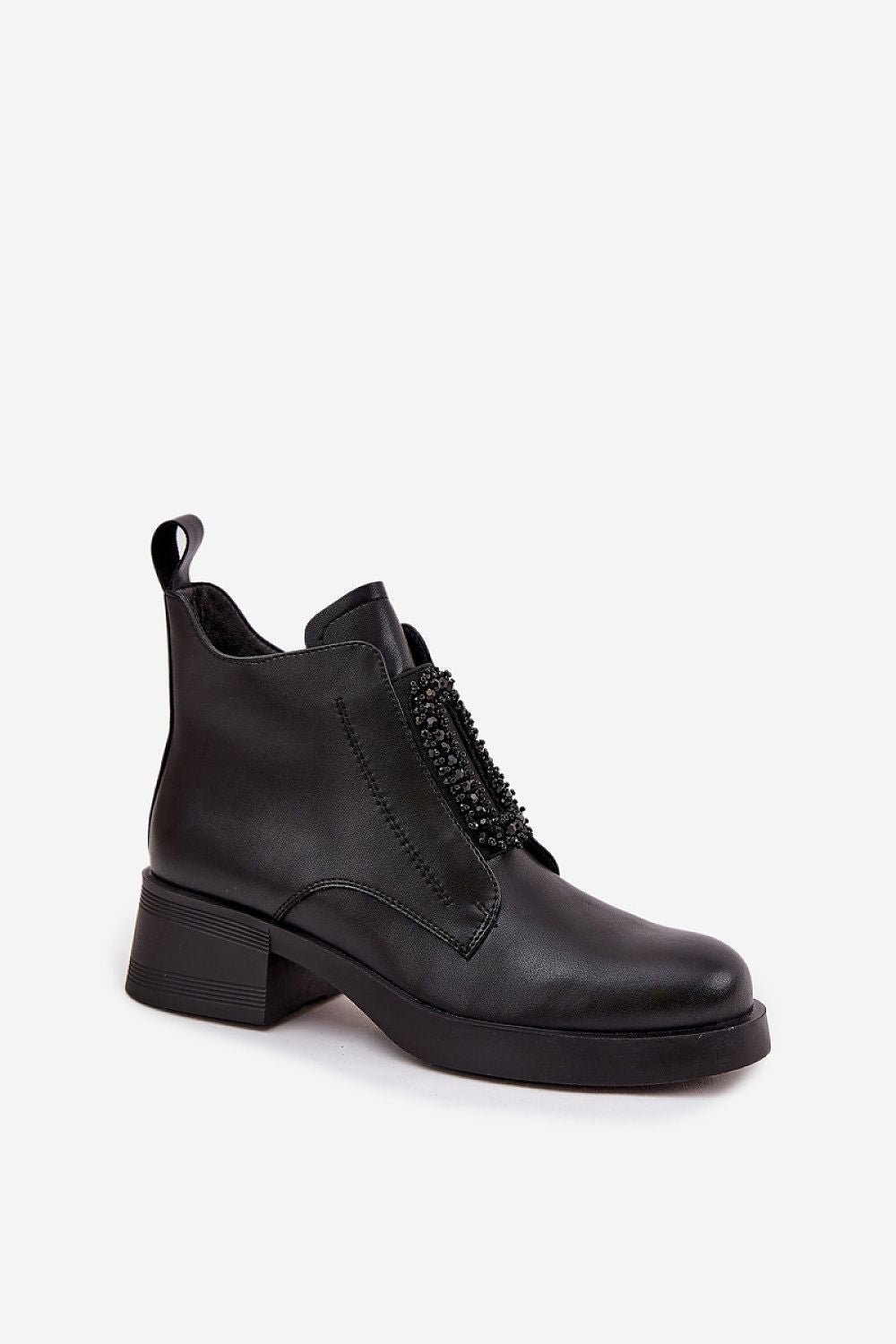 Close-up of the elegant bead decoration on Step in style's women's ankle boots, made from premium natural leather.