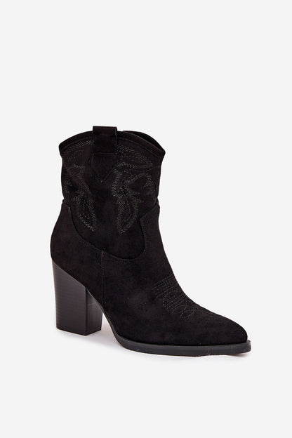 Step in Style’s luxurious women's cowboy ankle boots with decorative stitching and eco-friendly materials, designed to enhance every outfit.