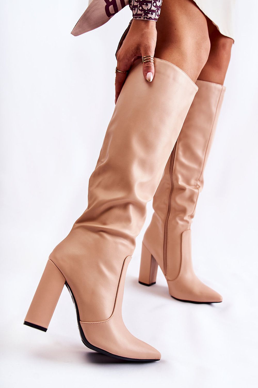 Elegant eco leather high-heeled boots with pointed toe and zip closure, crafted by Step in Style. Perfectly designed to elevate your silhouette.