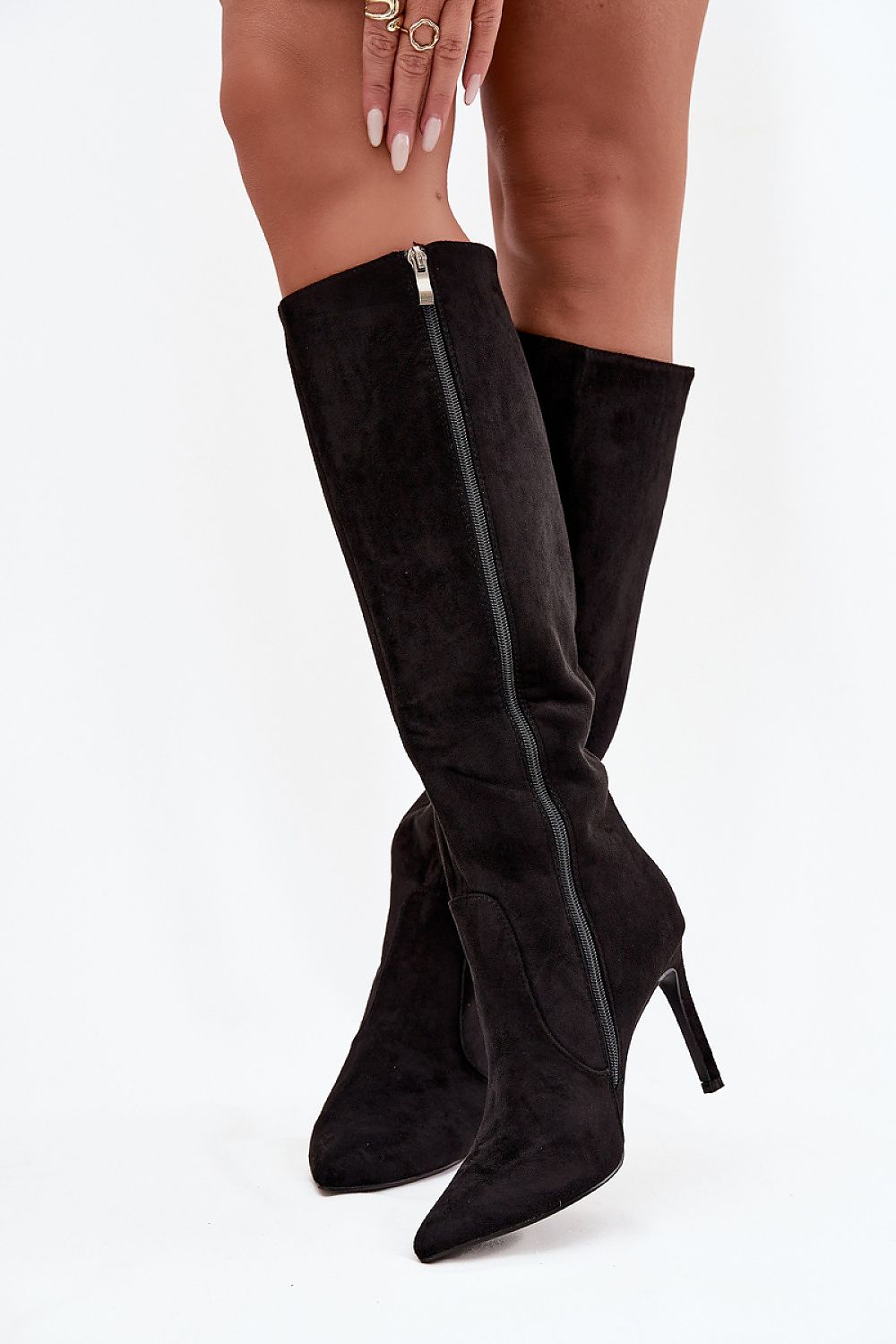 Fashionable women's eco suede stiletto boots from Step in Style, highlighting their sleek cut and feminine shape, ideal for winter styling.