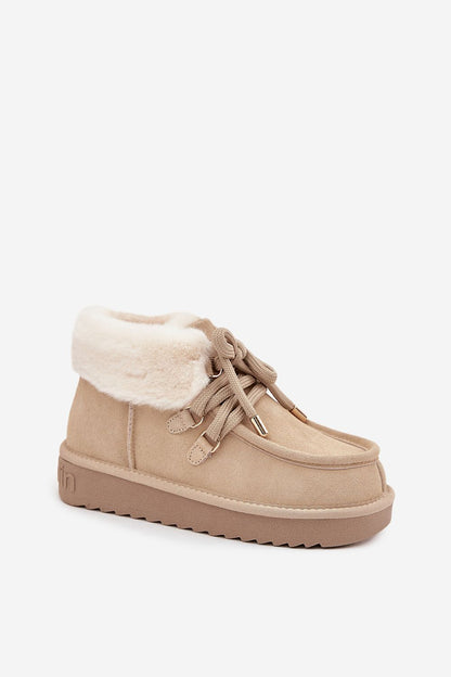 Elegant suede snow boots for women by Step in Style, featuring a luxurious fur lining and stylish design perfect for winter.