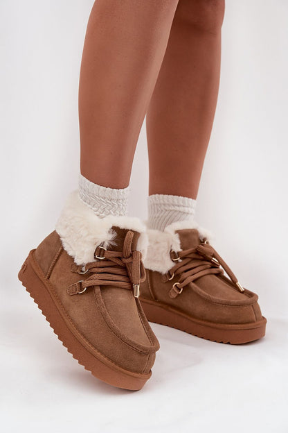 Trendy Women's D.Franklin Suede Snow Boots with a rubber sole designed for stability, merging style and functionality for winter outings.