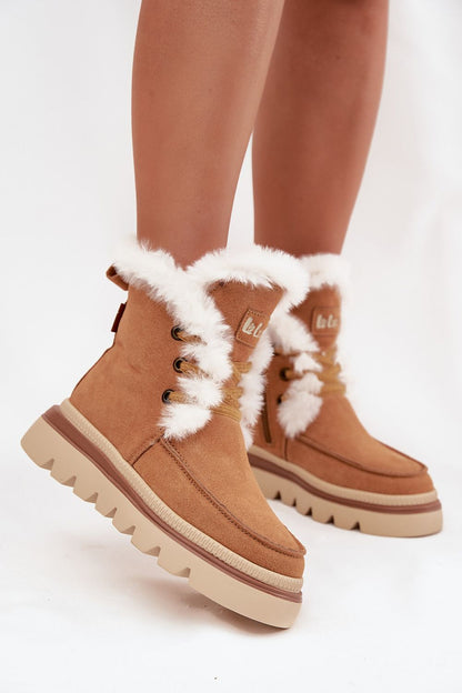 Luxury Lee Cooper women's suede snow boots with fur lining, featuring a durable rubber sole for unparalleled grip and comfort during winter excursions.