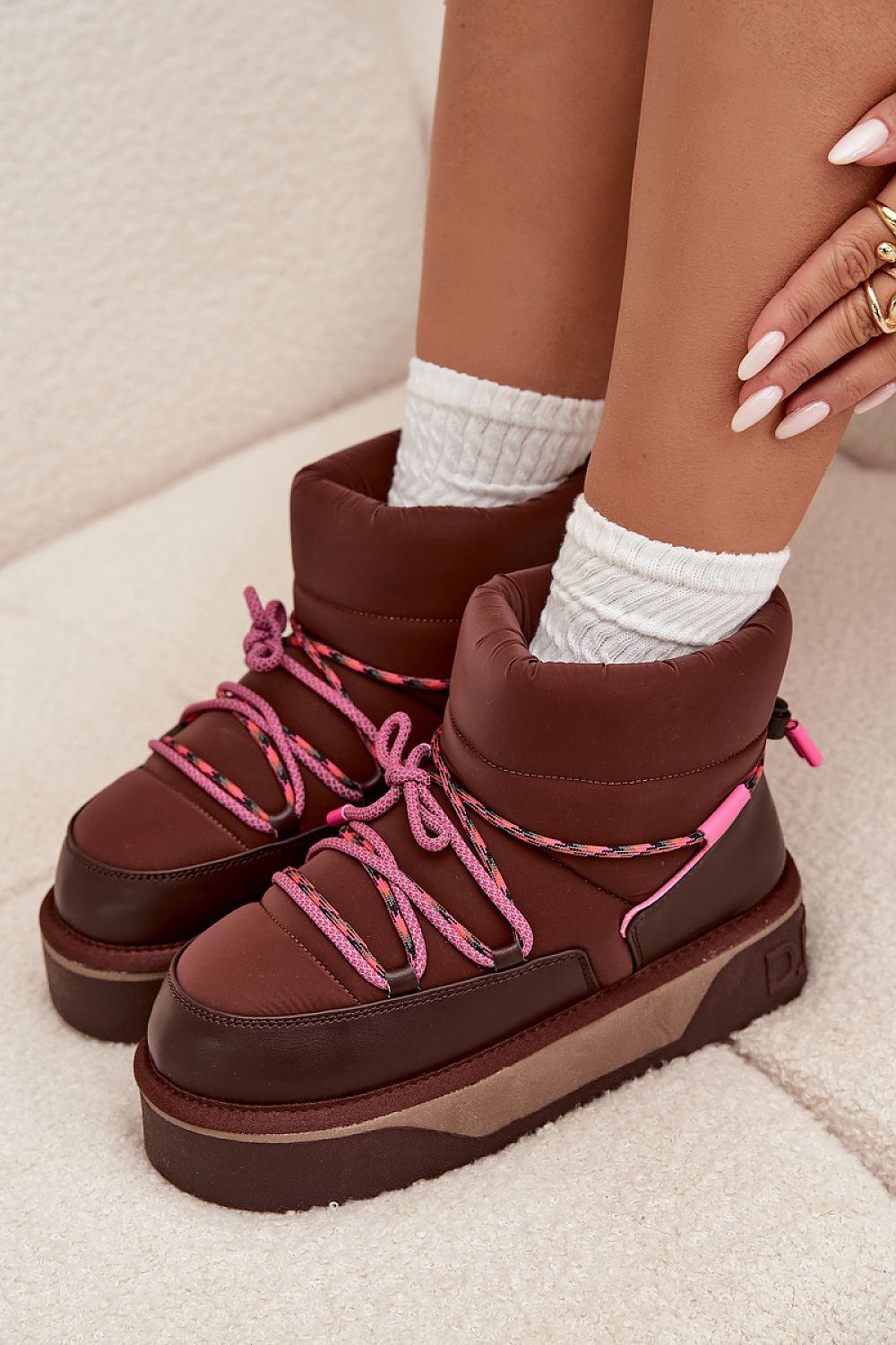 Step in Style luxury women's snow boots showcasing a stylish design with a durable rubber sole, perfect for winter adventures with warm fur lining.