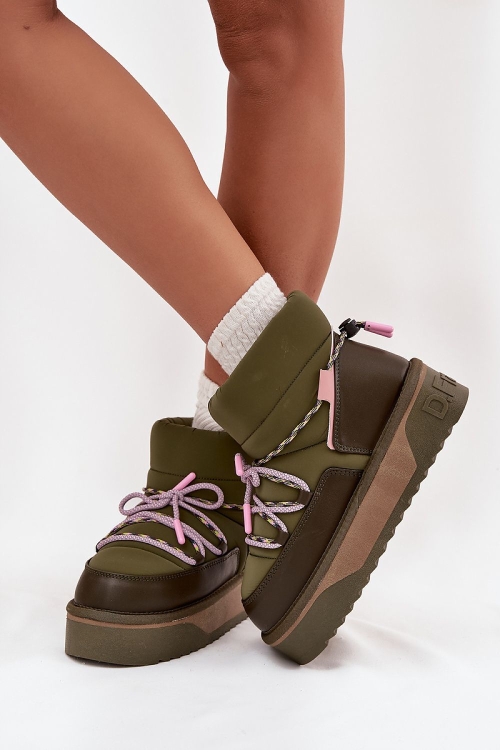 D.Franklin Women's Waterproof Snow Boots with Fur Lining, luxurious winter footwear from Step in Style, showcasing stylish two-tone laces and elegant design.