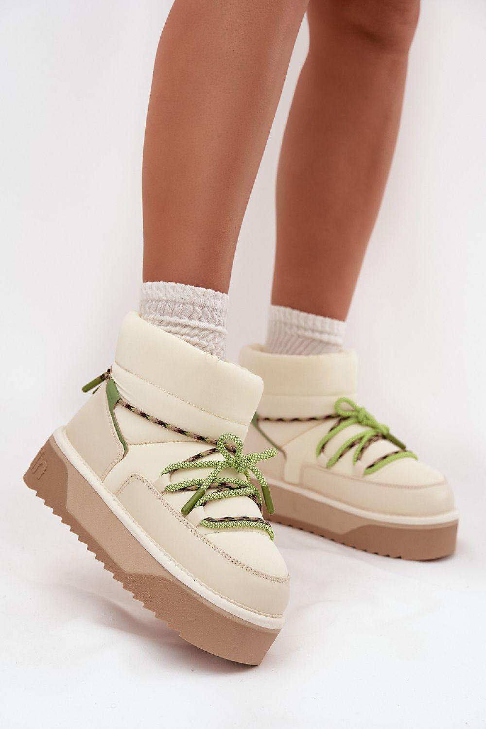 Close-up of D.Franklin Women's Waterproof Snow Boots, featuring soft fur lining and high-quality synthetic materials, perfect for chic winter styling by Step in Style.
