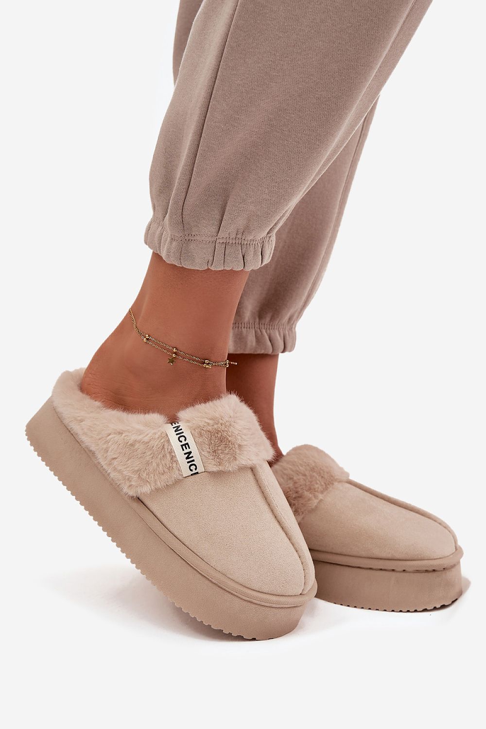 Close-up of premium women's eco-suede slippers from Step in Style, highlighting the soft fur lining for ultimate comfort and elegance.