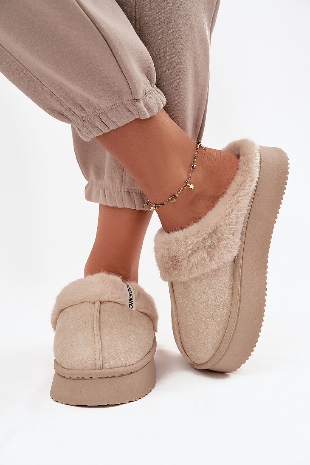 Luxurious women's eco-suede slippers from Step in style, designed with a fur interior for ultimate comfort and style at home.