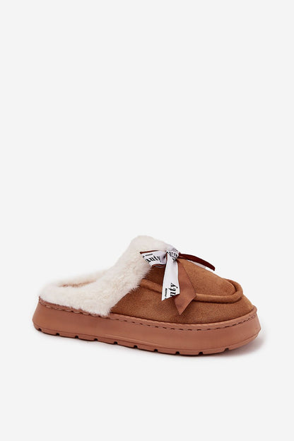 Elegant women's slippers with a thick sole and soft eco-suede fabric by Step in Style, adorned with fluffy fur lining and a pretty bow.