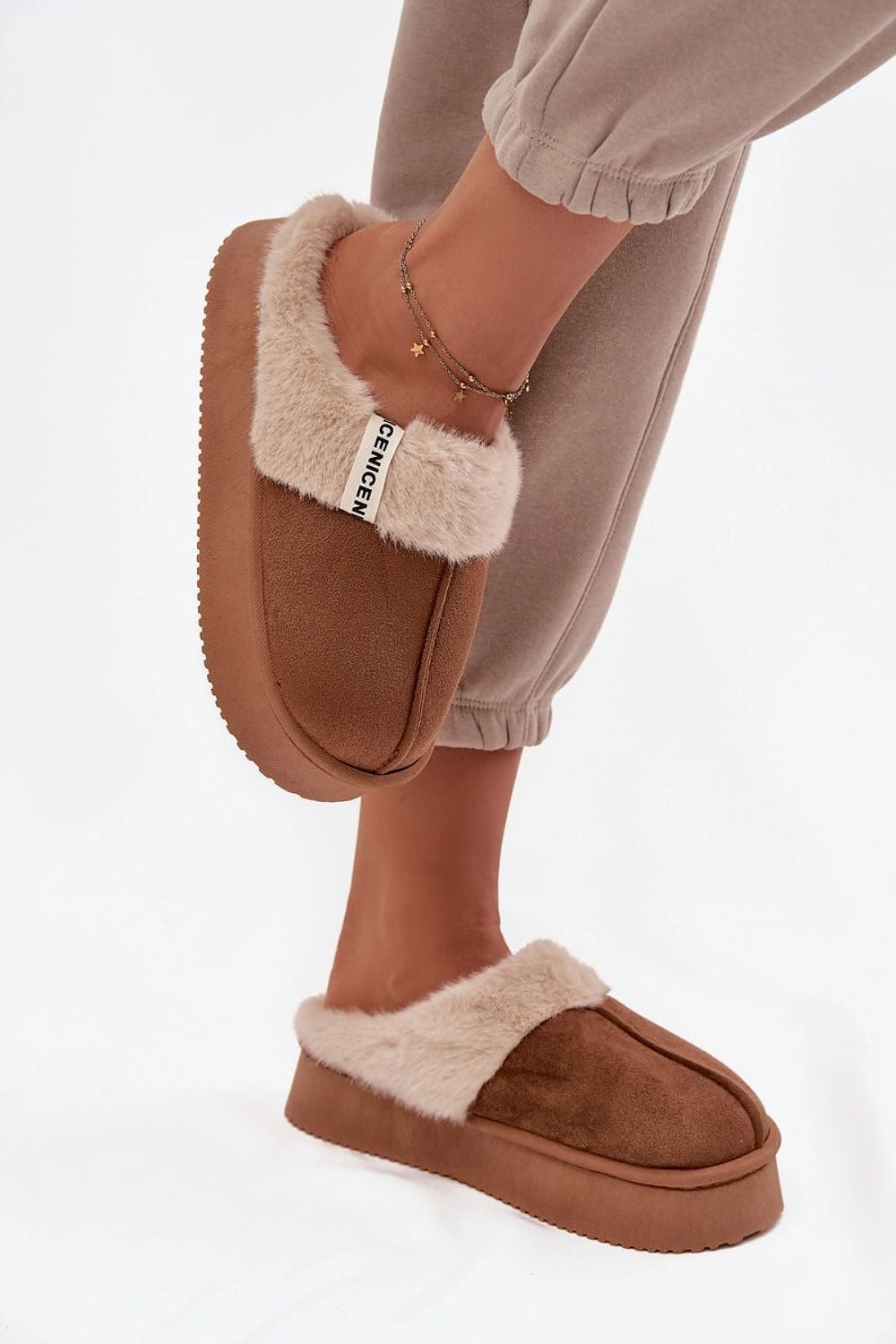 Elegant women's eco-suede slippers by Step in Style showcasing fur lining for enhanced warmth and sophisticated style.