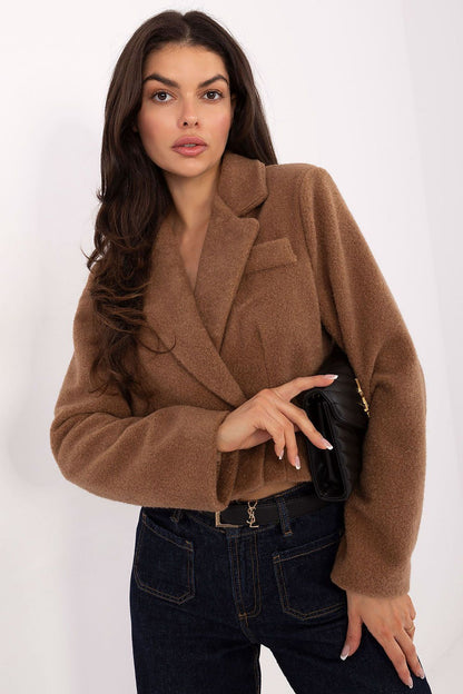 Rue Paris women's double-breasted coat displayed in sizes S/M and L/XL, illustrating versatility in style and fit for the modern woman.