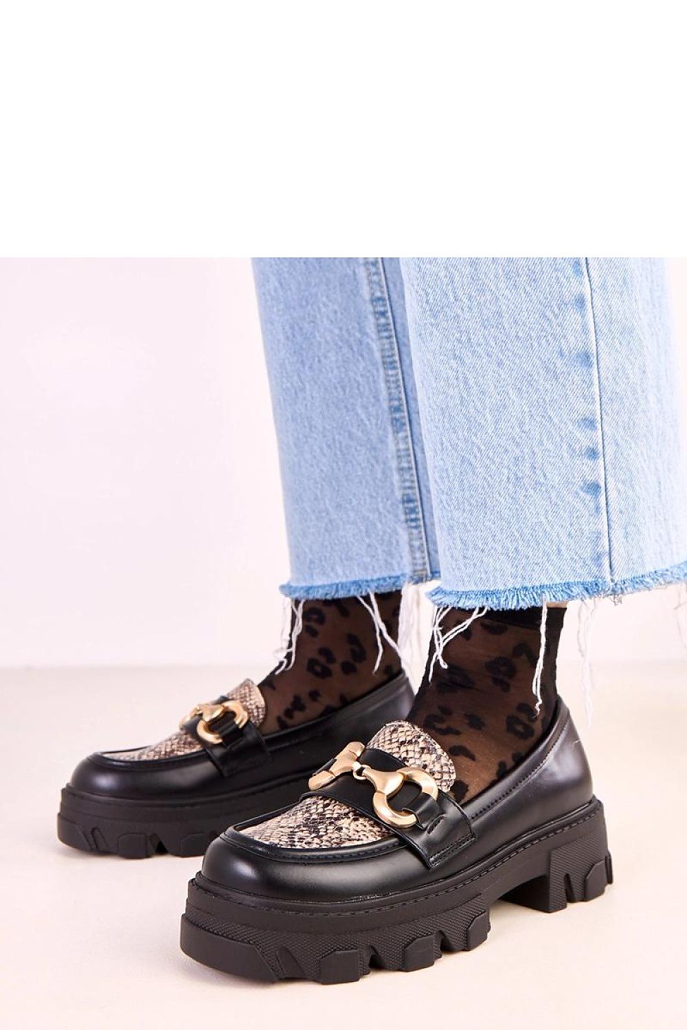 Elegant Solea Moccasins in eco-leather featuring a trendy animal motif and a gold ornament, perfect for sophisticated women's fashion.