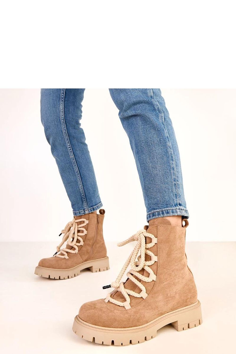 Stylish Solea ankle boots displayed in different sizes (EU 36-41), featuring eco-friendly suede leather, side zipper, and comfortable design, perfect for both casual and elegant looks.