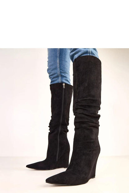 Luxury Solea buskin boots in elegant knee-high design made from high-quality ecological suede leather, featuring a pointed toe and an 11 cm wedge heel.