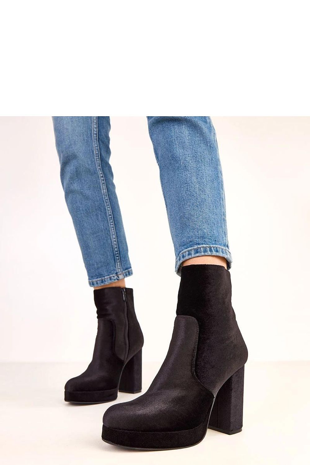 Solea exquisite suede ankle boots showcasing a perfect fit with a zipper closure, elevating your footwear style effortlessly.