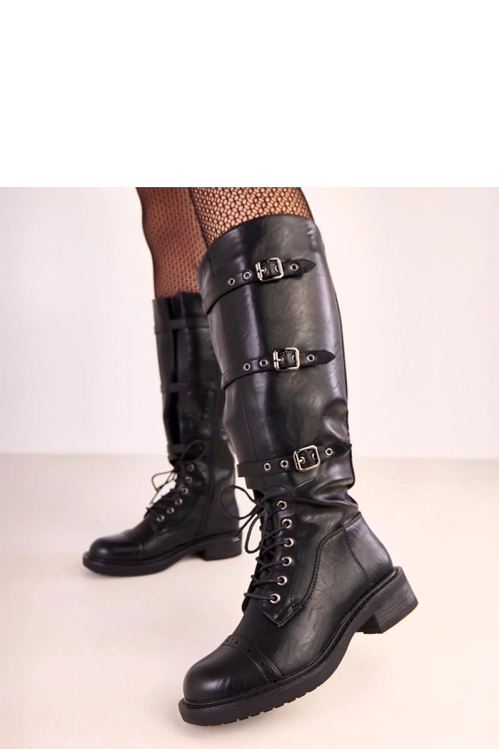 Close-up of Solea Vintage Style Thigh-High Boots showcasing the luxurious faux leather texture and sophisticated buckle details.