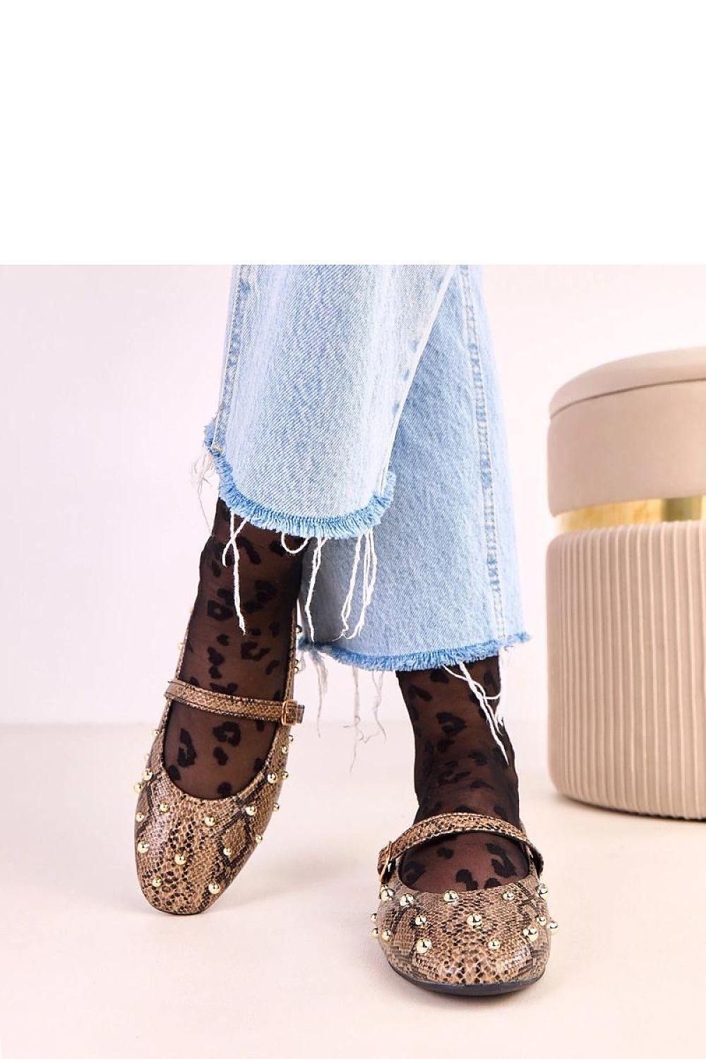 Stylish Solea ballerina flats with a strap, featuring eco-leather and a chic snake pattern, perfect for adding a touch of sophistication to any outfit.