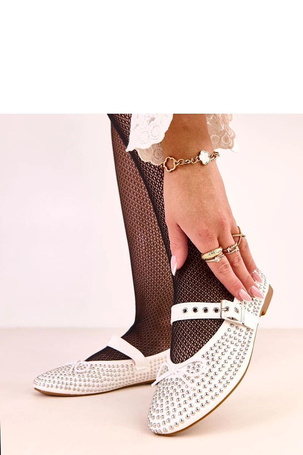 Solea Eco-Leather Ballet Flats in elegant black with bow and stud details, showcasing luxurious style and comfort.