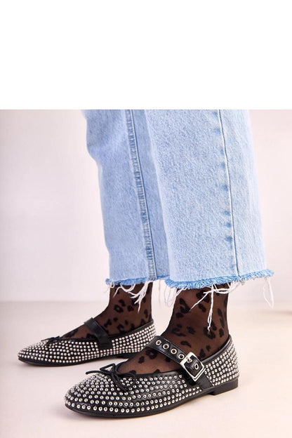 Solea eco-leather ballet flats showcasing a timeless design with delicate studs and a bow, ideal for adding luxury to any outfit.