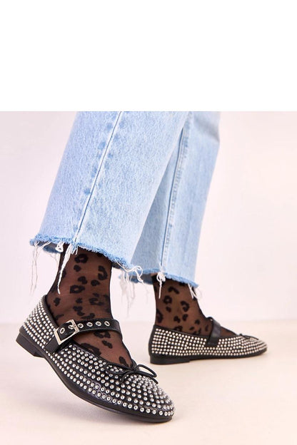 Solea eco-leather ballet flats styled with a graceful bow and chic studs, embodying elegance and comfort for discerning women.