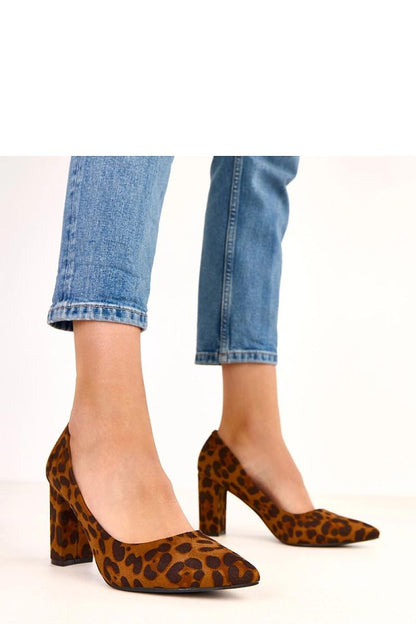 Solea luxurious block heel pumps featuring a striking panther print in eco-friendly suede, perfect for stylish occasions and elegant outfits.