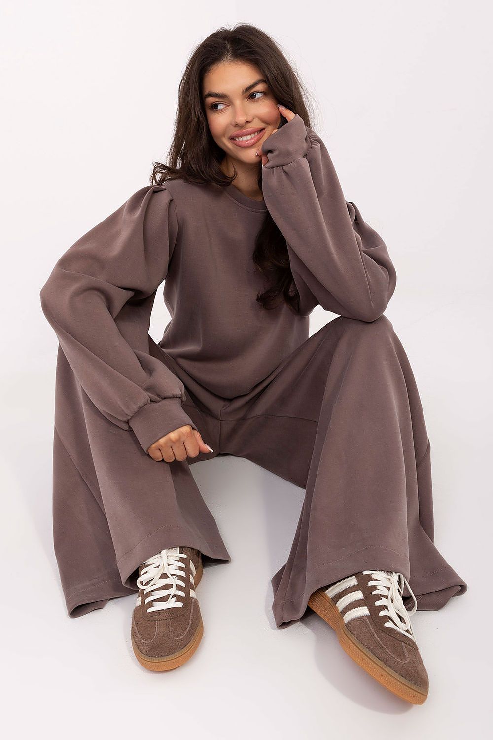 Elegant high-waisted wide leg sweatpants from Factory Price, crafted in a soft modal and viscose blend with functional pockets, perfect for luxury casual wear.