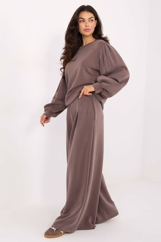 Stylish high-waisted wide leg sweatpants by Factory Price, featuring decorative pleats and a comfortable elastic waistband, embodying a blend of elegance and everyday sophistication.