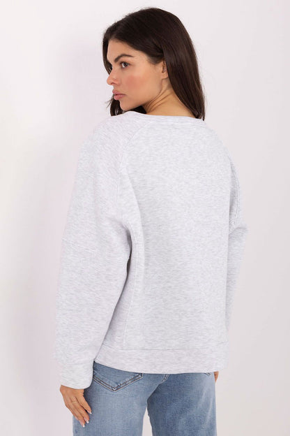 Elegant women's oversized sweatshirt from Factory Price, crafted from a comfortable cotton blend, designed for effortless layering and casual sophistication.