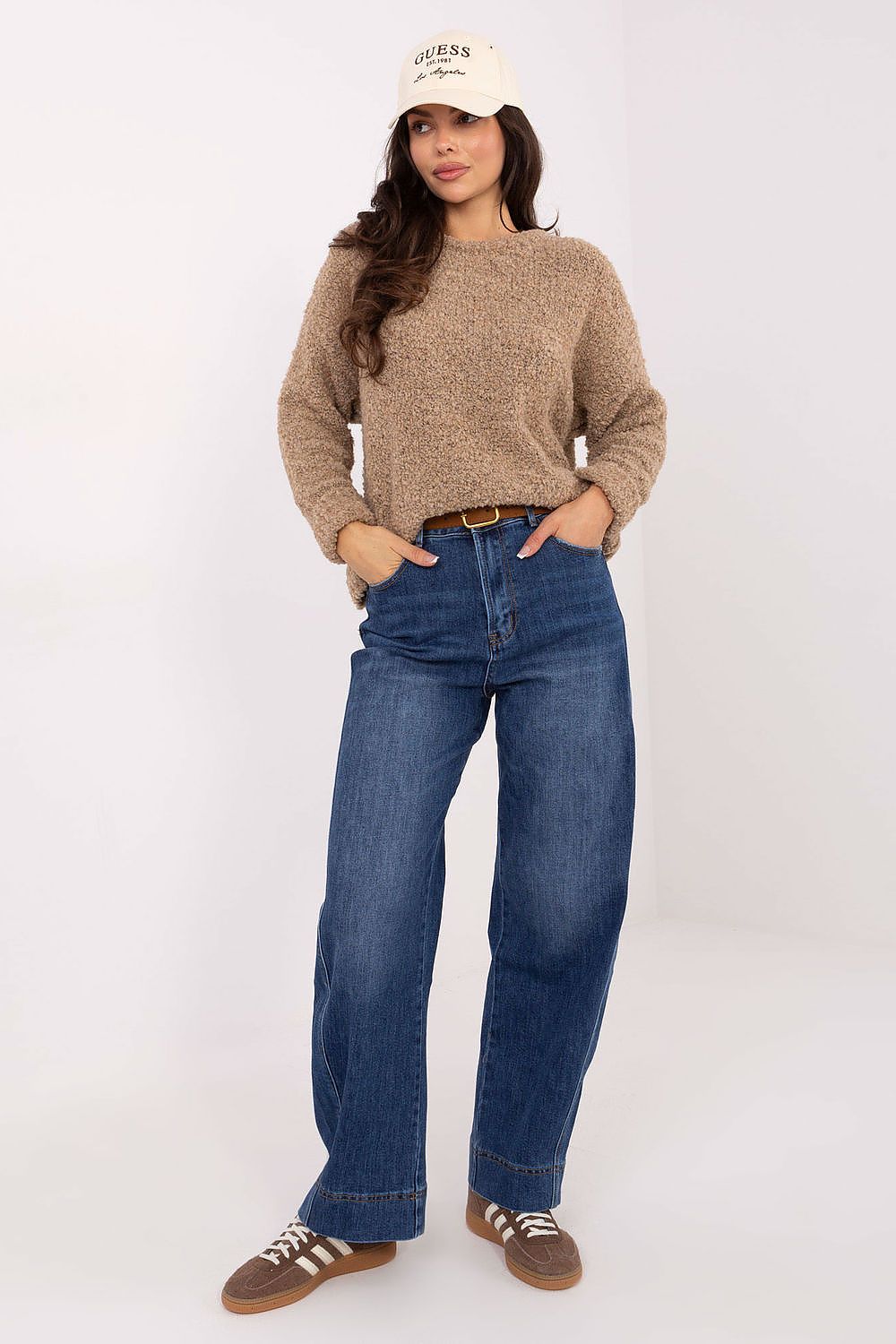 Women's high waist balloon fit jeans by Factory Price, showcasing a stylish and elegant casual look.