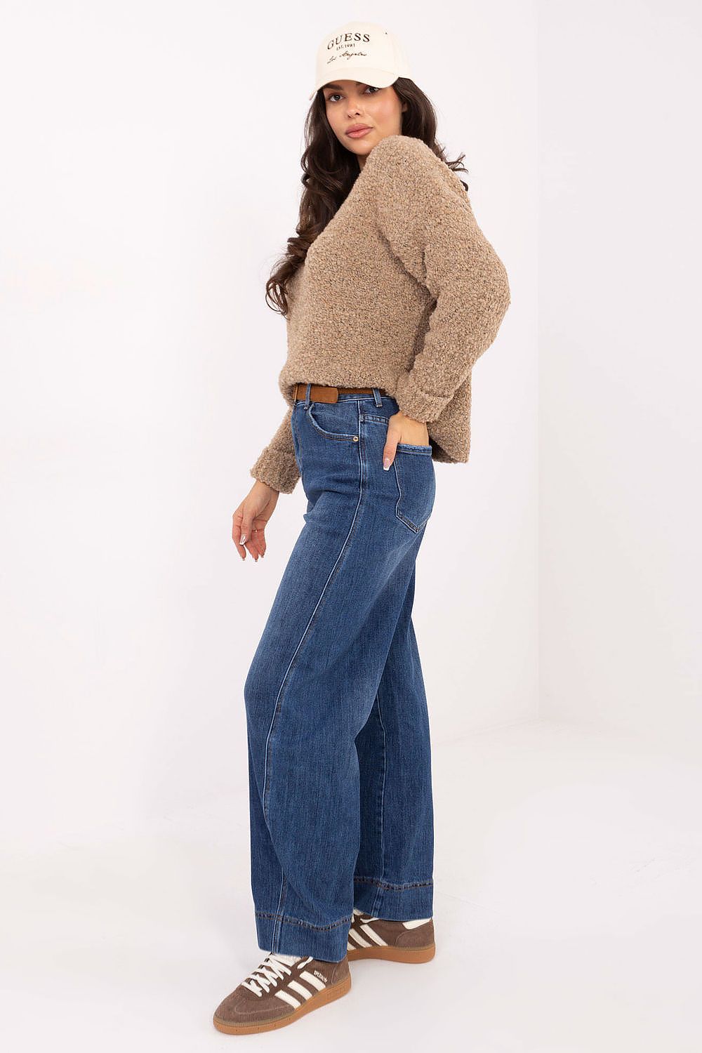 Elegant stylish women's high-waisted balloon fit jeans from Factory Price, featuring a comfortable elastic denim blend suitable for all-day wear.