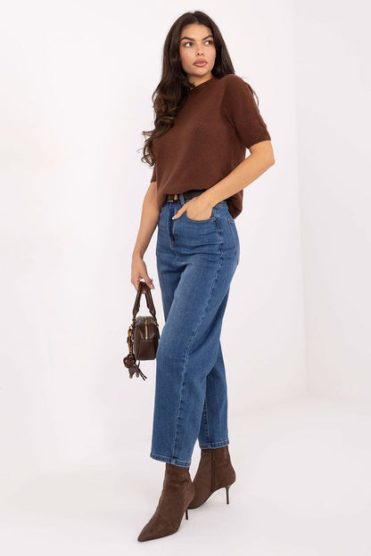 Close-up view of the luxurious fabric of Women's Balloon Fit Jeans by Factory Price, highlighting the quality cotton blend and elegant high-waisted silhouette.