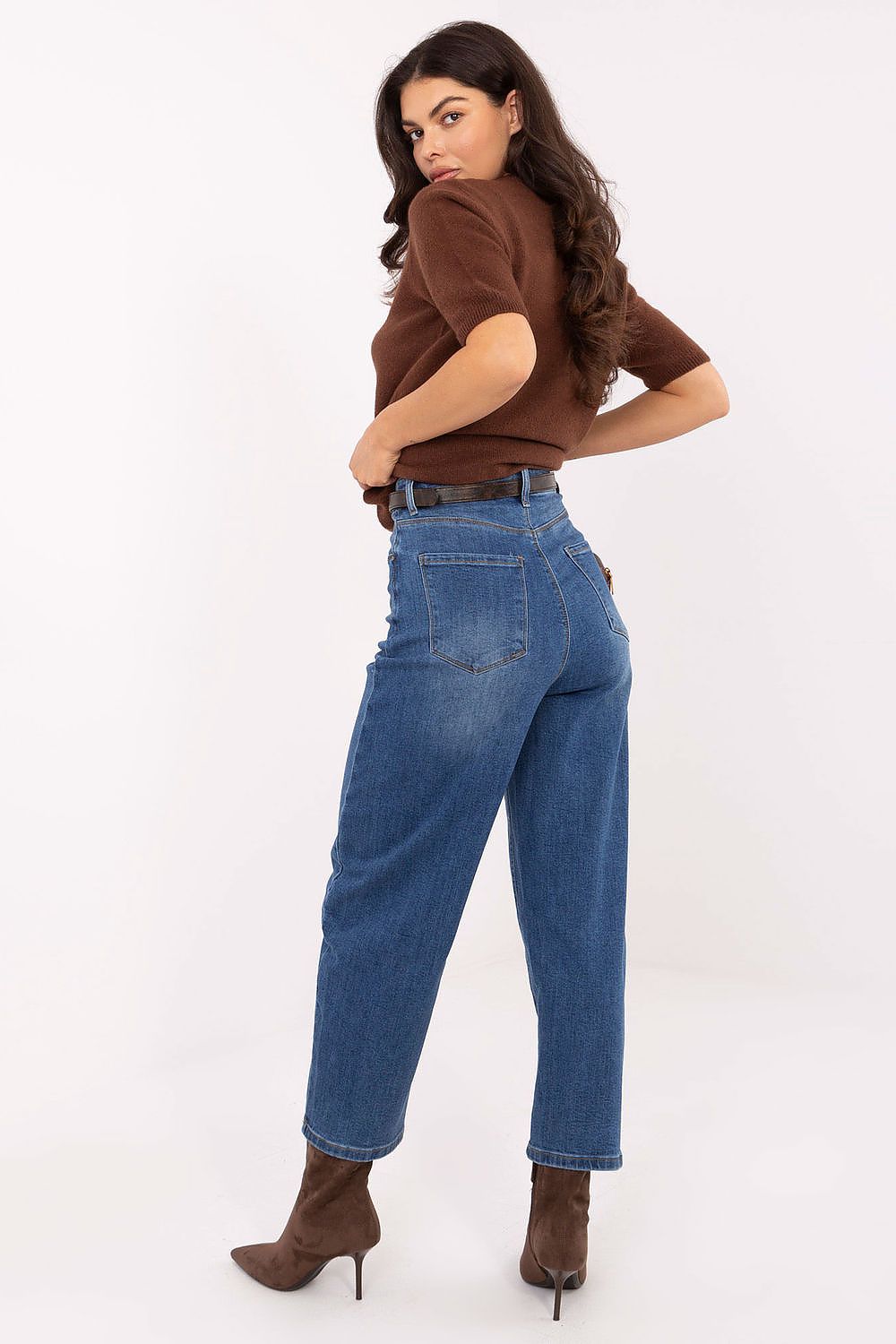Stylish display of the Women's Balloon Fit Jeans by Factory Price, featuring a chic tapered look, practical pockets, and a decorative ribbon belt for added sophistication.