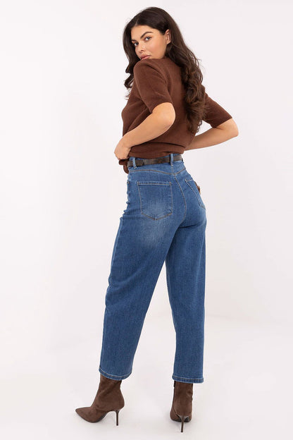 Stylish display of the Women's Balloon Fit Jeans by Factory Price, featuring a chic tapered look, practical pockets, and a decorative ribbon belt for added sophistication.