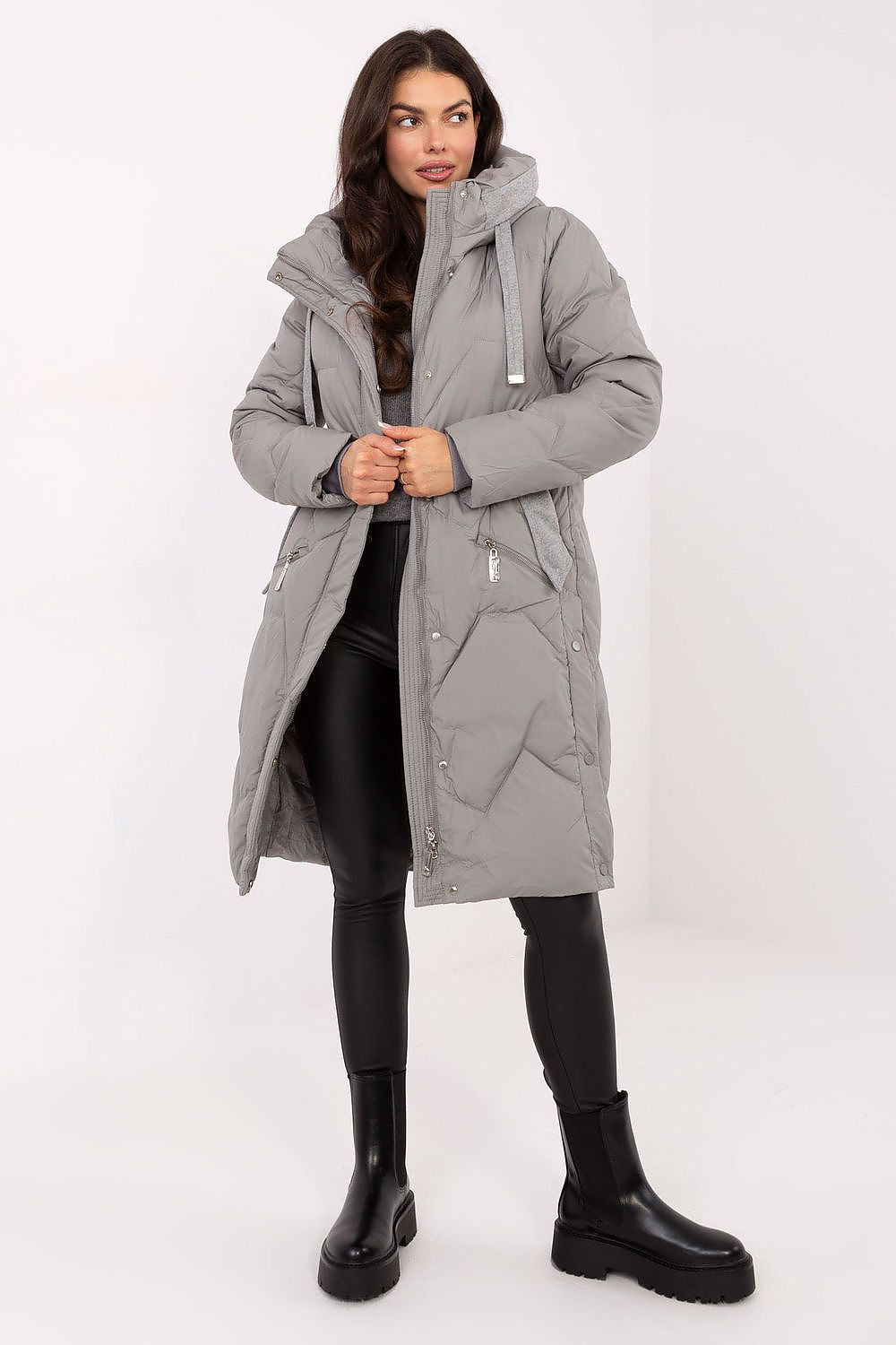 Detail of the zip and snaps fastening on the MBM Women's Long Down Jacket, illustrating functional elegance.