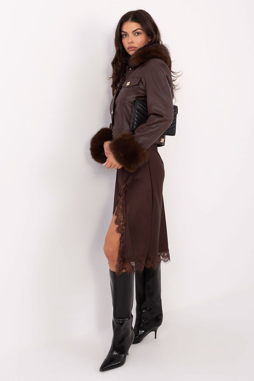 Sophisticated women's faux leather coat by MBM showcasing a flattering cut and luxurious fur interior, perfect for casual elegance.