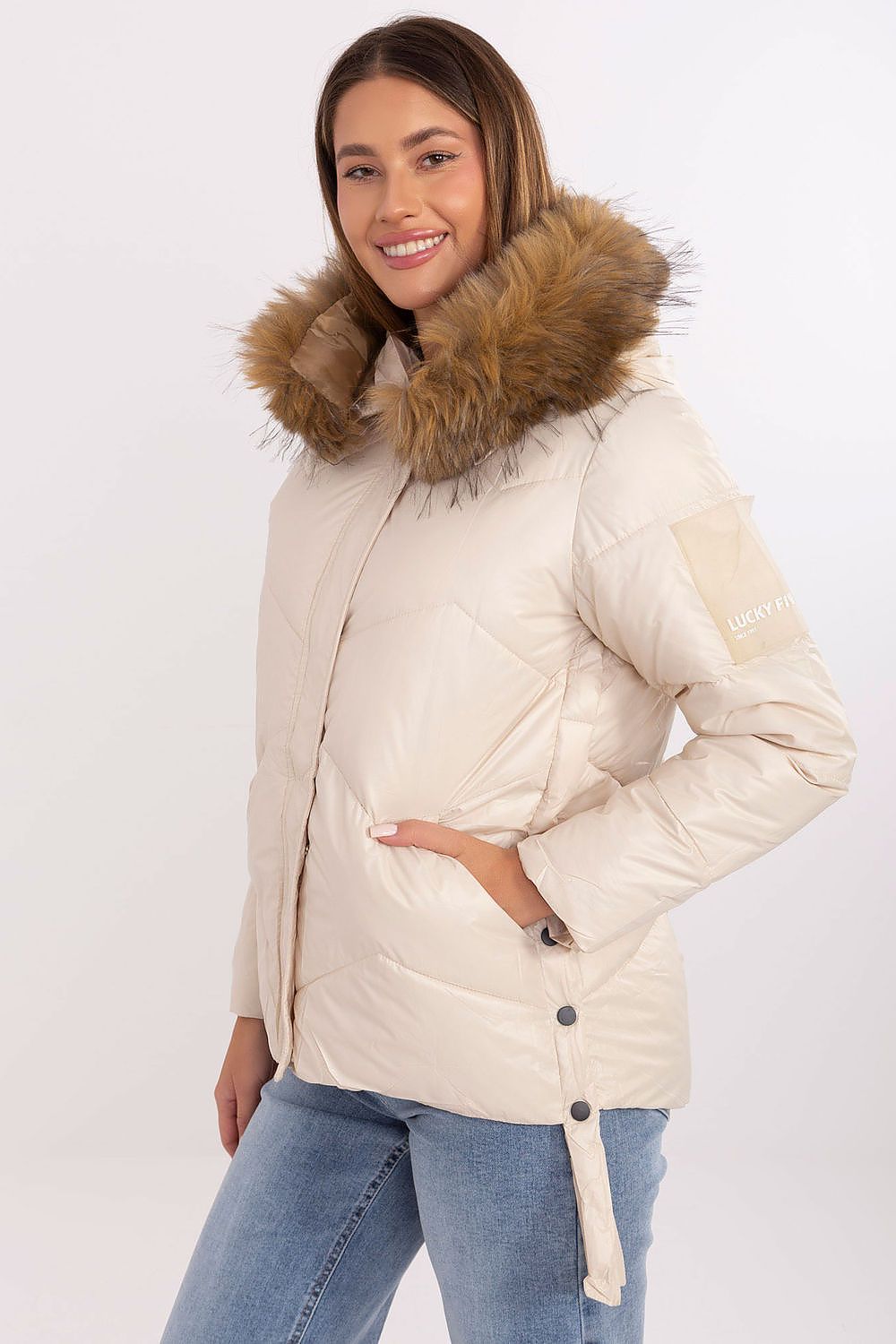 Close-up of the luxurious synthetic filling and insulated lining in an MBM women's down jacket, highlighting its exquisite comfort and modern feminine silhouette.