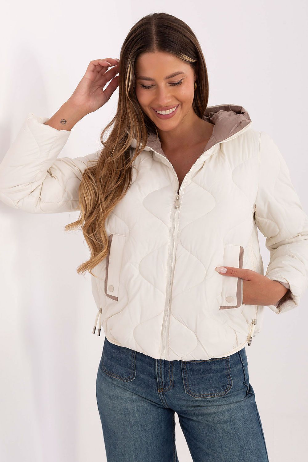 Stylish women's quilted transitional jacket with hood by MBM, perfect for autumn and winter, showcasing a sleek silhouette and modern design.