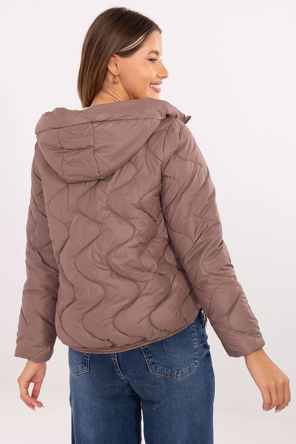 Luxurious MBM women's quilted jacket with a shorter cut, designed for elegance and freedom of movement, ideal for both casual and work styles.